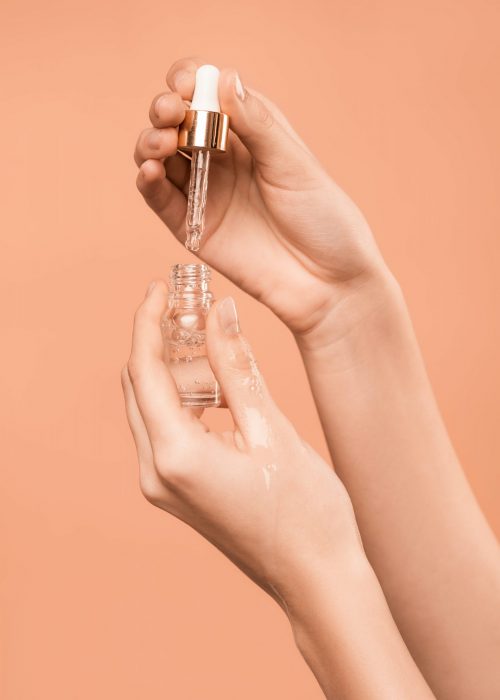 person-holding-serum-bottle-3762882 (1)