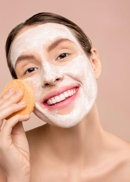 woman-washing-her-face-3762460